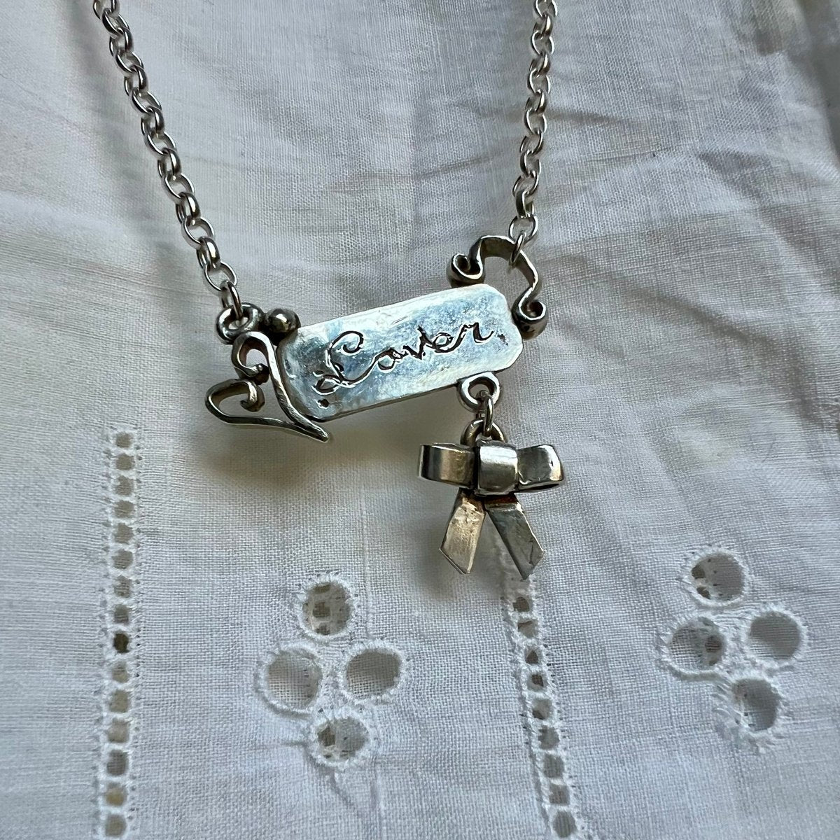 ‘Lover’ inscribed pendant